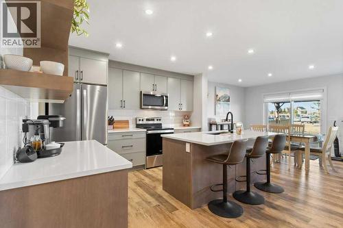 16 Trinity Street, Lacombe, AB - Indoor Photo Showing Kitchen With Upgraded Kitchen