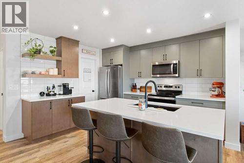 16 Trinity Street, Lacombe, AB - Indoor Photo Showing Kitchen With Double Sink With Upgraded Kitchen