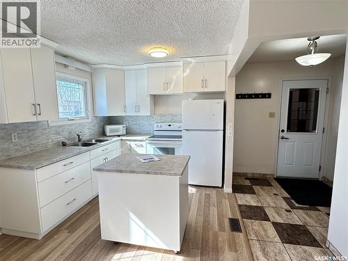 44 Campbell Place, Clavet, SK - Indoor Photo Showing Kitchen With Double Sink