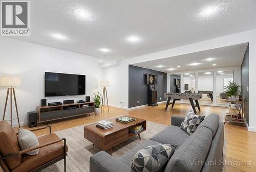 360 Parkmere Green, Chestermere, AB - Indoor Photo Showing Living Room