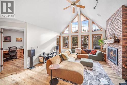 108 Lougheed Circle, Banff, AB - Indoor Photo Showing Living Room With Fireplace