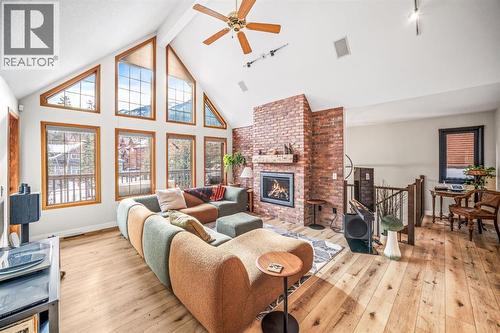 108 Lougheed Circle, Banff, AB - Indoor Photo Showing Other Room With Fireplace