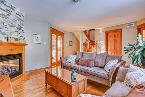 Salon - 8275 Rue Du Labour, Mirabel, QC - Indoor Photo Showing Living Room With Fireplace