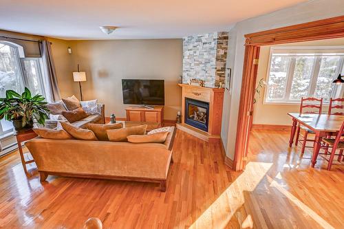 Salon - 8275 Rue Du Labour, Mirabel, QC - Indoor Photo Showing Living Room With Fireplace