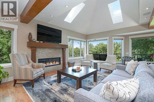664 29 Avenue Nw, Calgary, AB - Indoor Photo Showing Living Room With Fireplace
