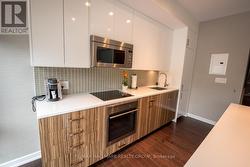 Kitchen with Quartz Counters & European Appliances - 