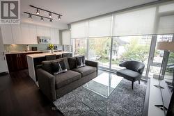 Living Room and Kitchen with Hardwood Floors - 