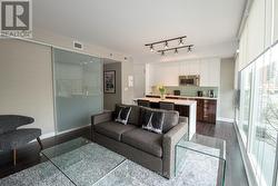 Living Room and Kitchen with Hardwood Floors - 