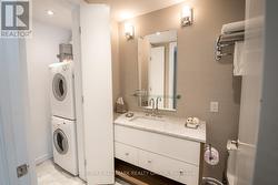 Bathroom with Marble and Glass Shower - 