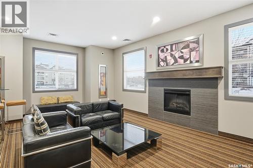 207C 415 Hunter Road, Saskatoon, SK - Indoor Photo Showing Living Room With Fireplace