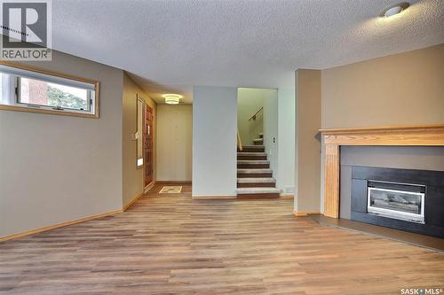 25 2338 Assiniboine Avenue E, Regina, SK - Indoor Photo Showing Living Room With Fireplace