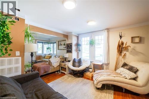 Living room featuring wood finished floors and ornamental molding - 41 Paradise Road S, Hamilton, ON - Indoor Photo Showing Living Room