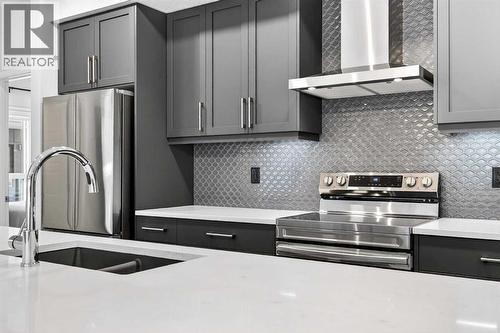 6205, 20295 Seton Way Se, Calgary, AB - Indoor Photo Showing Kitchen With Double Sink With Upgraded Kitchen