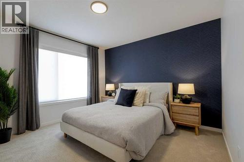 209, 81 Midtown Boulevard Sw, Airdrie, AB - Indoor Photo Showing Bedroom