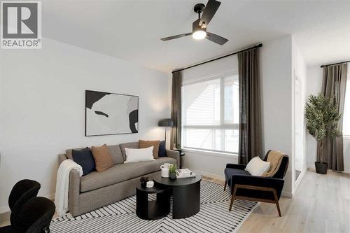 209, 81 Midtown Boulevard Sw, Airdrie, AB - Indoor Photo Showing Living Room