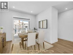 Dining Area - Virtually staged to show possibilities. Photo of a similar home in the community. - 