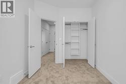 Custom shelving. Photo of a similar home in the community. - 