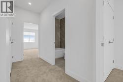 Top floor hallway. Photo of a similar home in the community. - 