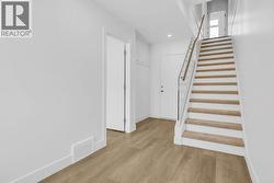 Lower level. Photo of a similar home in the community. - 