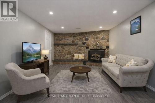 1057 King Street E, Oshawa, ON - Indoor Photo Showing Living Room With Fireplace