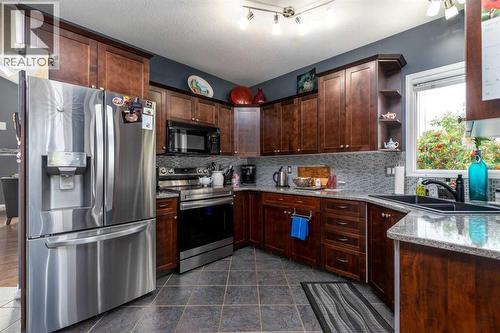 3812 58 Avenue, Lloydminster, AB - Indoor Photo Showing Kitchen With Double Sink
