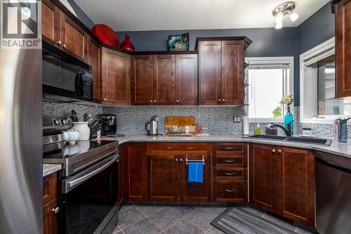 3812 58 Avenue, Lloydminster, AB - Indoor Photo Showing Kitchen With Double Sink