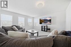 Versatile upper bonus room for movie nights, play space, or home office - 