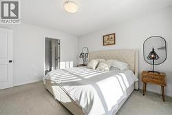 A serene primary retreat with spacious layout and walk in closet - 