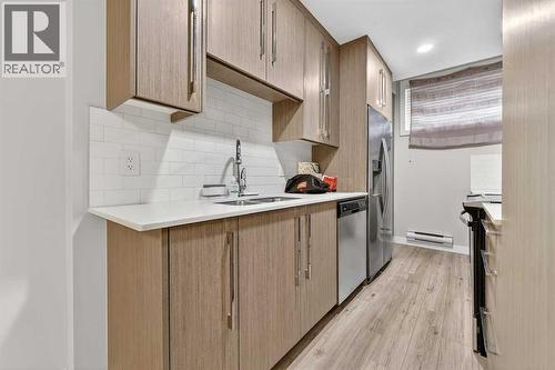 132 Corner Meadows Gate Ne, Calgary, AB - Indoor Photo Showing Kitchen With Double Sink