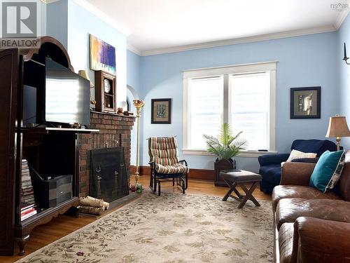 Living Room - 71 Havelock Street, Amherst, NS - Indoor Photo Showing Living Room With Fireplace