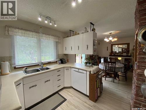 620 4Th Street, Eston, SK - Indoor Photo Showing Kitchen With Double Sink