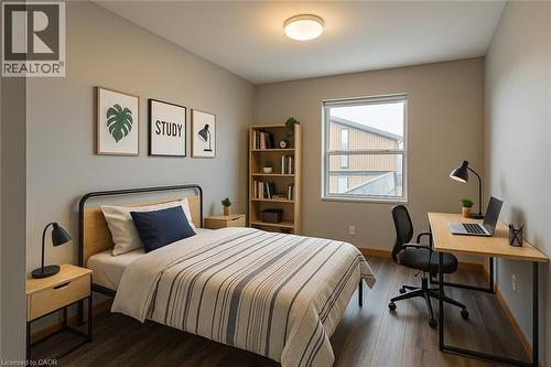 comes unfurnished (virtually staged) - 12 Bridgeport Road E Unit# 20, Waterloo, ON - Indoor Photo Showing Bedroom