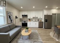 REAR - 67 WAYLAND AVENUE  Toronto, ON M4E 3C8