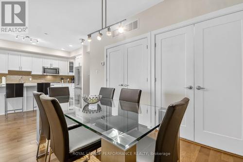 DR with laundry and utility closets - 408 - 615 Longfields Drive, Ottawa, ON - Indoor Photo Showing Dining Room