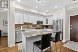 Bright kitchen with pot lights - 