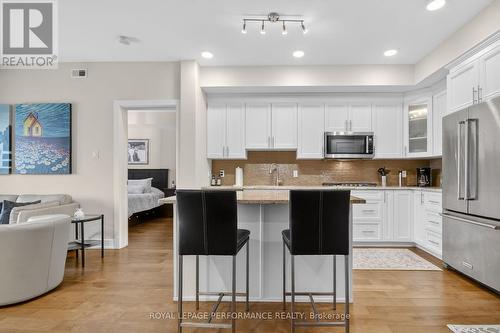 Master bedroom beyond the kitchen - 408 - 615 Longfields Drive, Ottawa, ON - Indoor Photo Showing Kitchen With Upgraded Kitchen