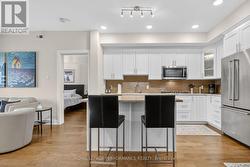 Master bedroom beyond the kitchen - 