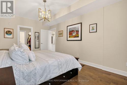 View to the walk-through closet to the ensuite - 408 - 615 Longfields Drive, Ottawa, ON - Indoor Photo Showing Bedroom