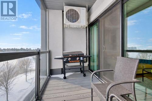 Large balcony, gas BBQ, mounted A/C, protective Fl - 408 - 615 Longfields Drive, Ottawa, ON - Outdoor With Balcony With Exterior