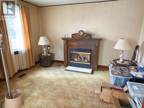 9106 Powers Road, Central Elgin, ON - Indoor Photo Showing Other Room With Fireplace