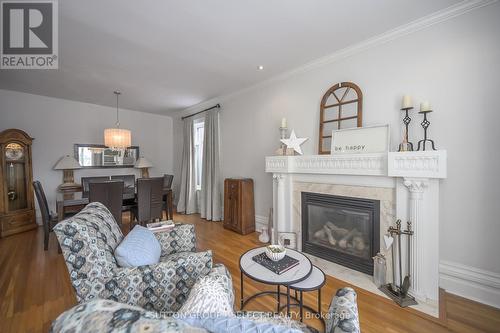 908 Maitland Street, London East (East B), ON - Indoor Photo Showing Living Room With Fireplace