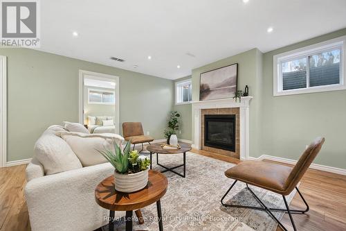 60A Eastview Road, Guelph (Grange Road), ON - Indoor Photo Showing Living Room With Fireplace