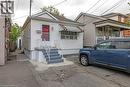 View of front facade with a shingled roof - 201 East 23Rd. Street, Hamilton, ON  - Outdoor 