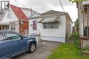 View of front facade with a shingled roof - 201 East 23Rd. Street, Hamilton, ON  - Outdoor 