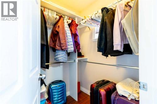 Walk in closet(primary ) - 1421 40 Street Sw, Calgary, AB - Indoor With Storage