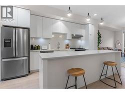 Great open concept with an island long enough to have 4 stools - 