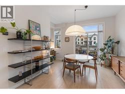 Bright dinning space with access to back deck over looking the park - 