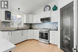 LOTS OF UPPER AND LOWER CABINETS - 