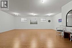 LOWER LEVEL FAMILY ROOM AREA HAS PLENTY OF ROOM TO ADD ADDITIONAL ROOMS - 