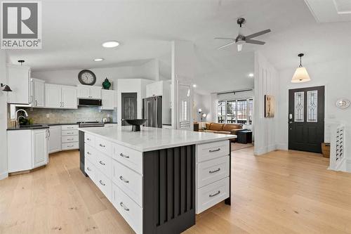 OVERSIZED ISLAND WITH STORAGE - 140 Allen Crescent, Vulcan, AB - Indoor Photo Showing Kitchen With Upgraded Kitchen